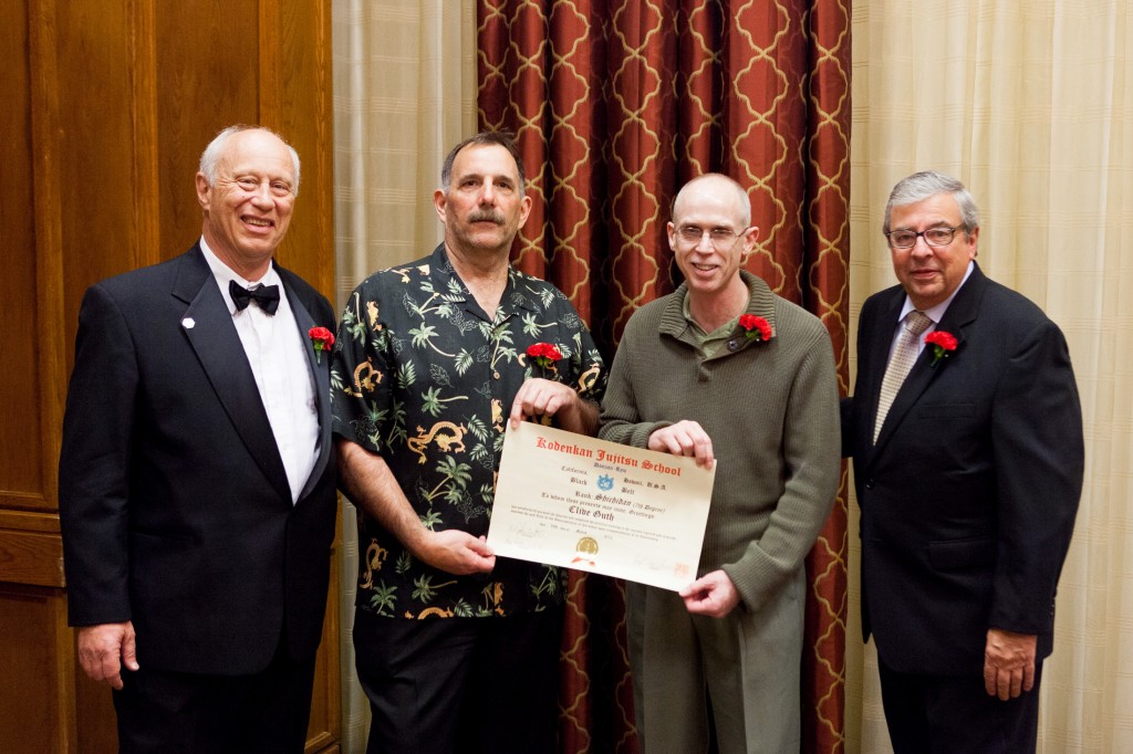 Prof. Clive Guth receiving his 7th Dan in 2012