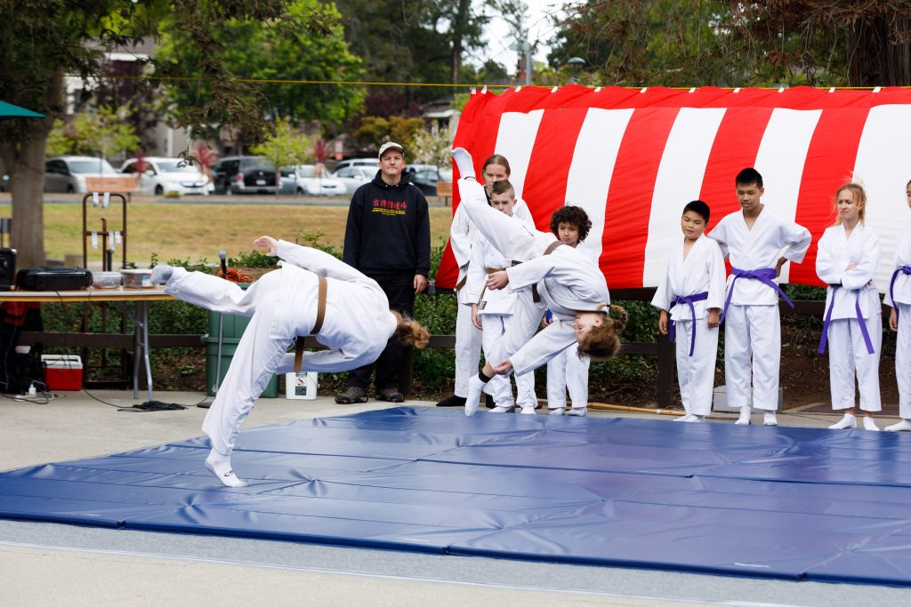 Kids demonstrate breakfalls - throwing themselves while falling safely